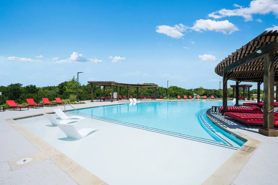 Highland Lakes pool and shaded seating pictured by Taylor Morrison