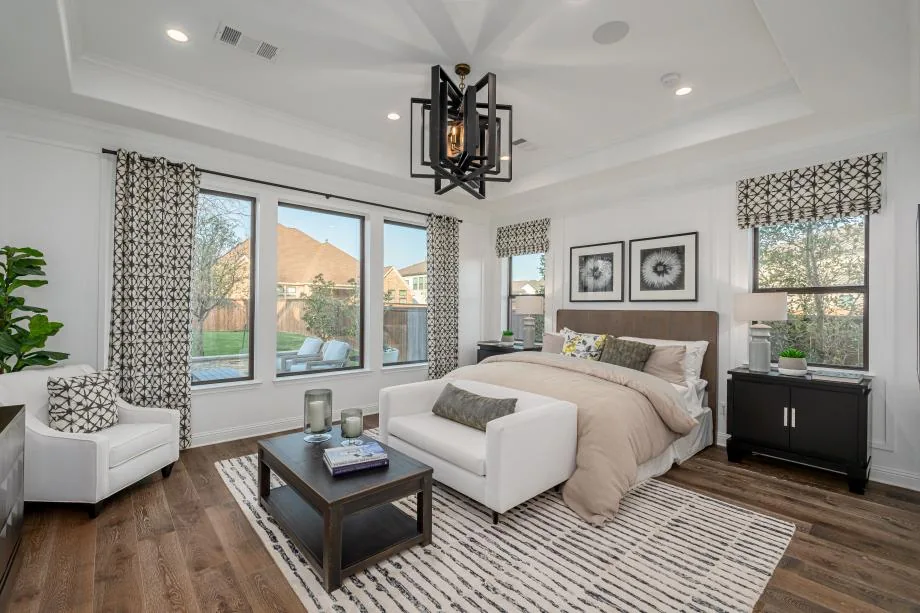 Primary bedroom in Toll Brothers’ Valen Italian Villa model at Star Trail