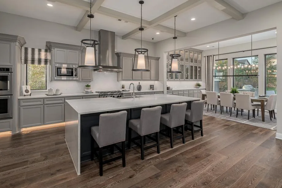 Kitchen and dining area in Toll Brothers’ Valen Italian Villa model at Star Trail