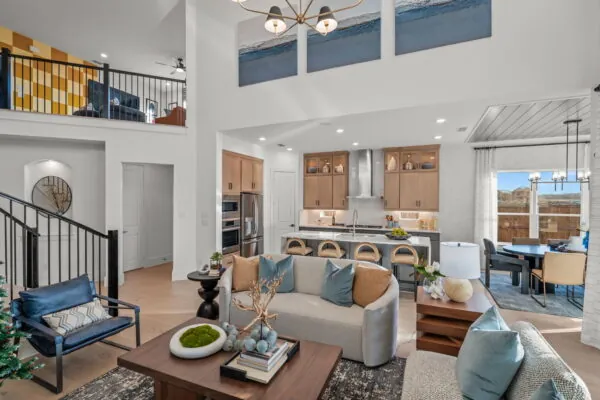 Two-story family room and open kitchen in the Hudson model at 6801 Baxley Road
