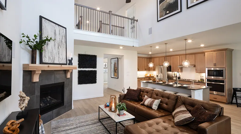 Two-story living area and kitchen in the Terracotta model gallery at Highland Lakes