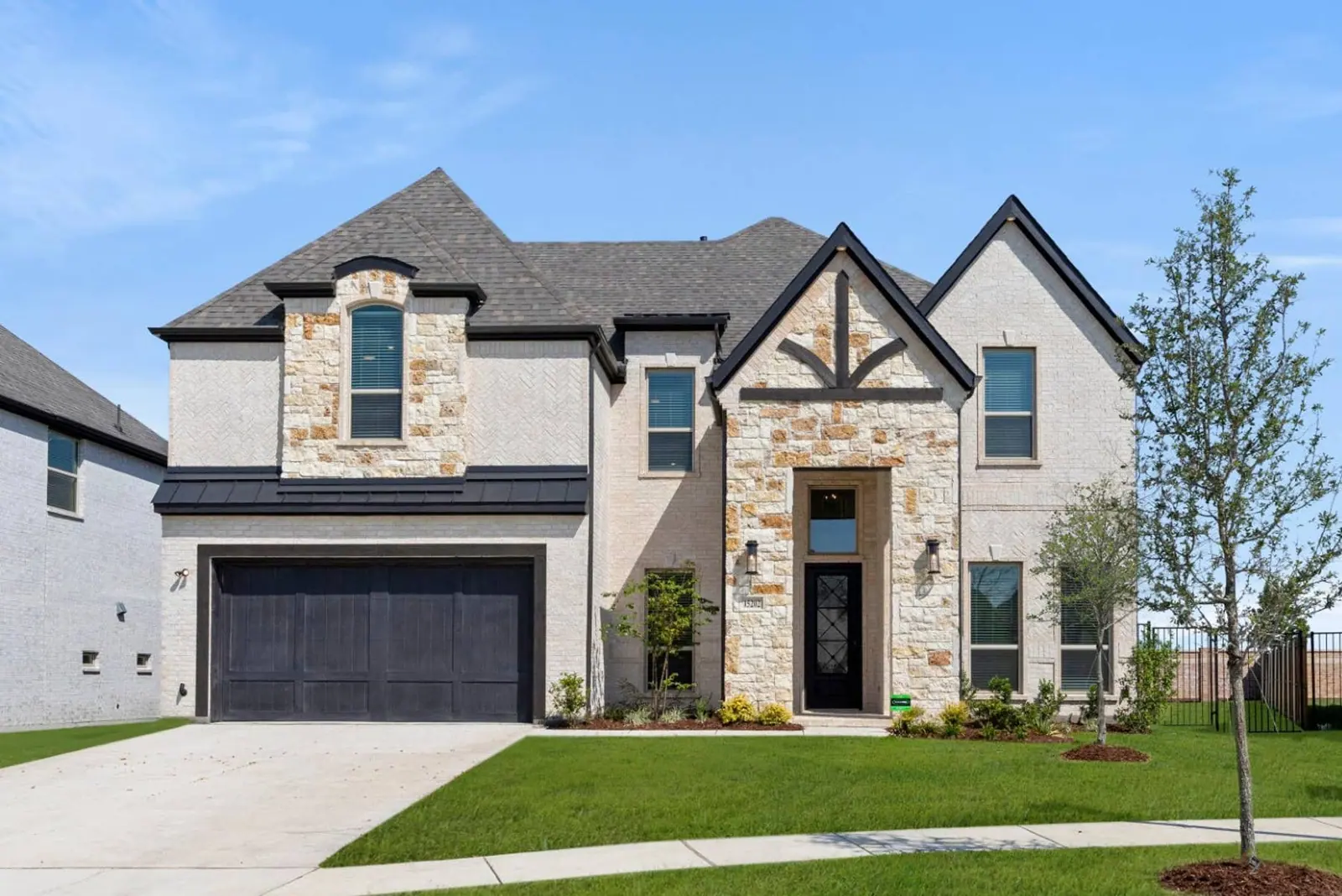 First Texas Homes’ published exterior photograph of 15202 Reunion Drive in Collinsbrook Farm, Frisco
