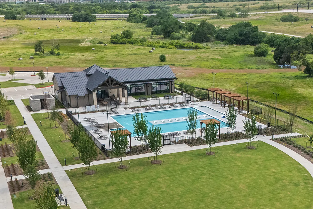 East Village pool and amenity building shown on the official Fields developer page